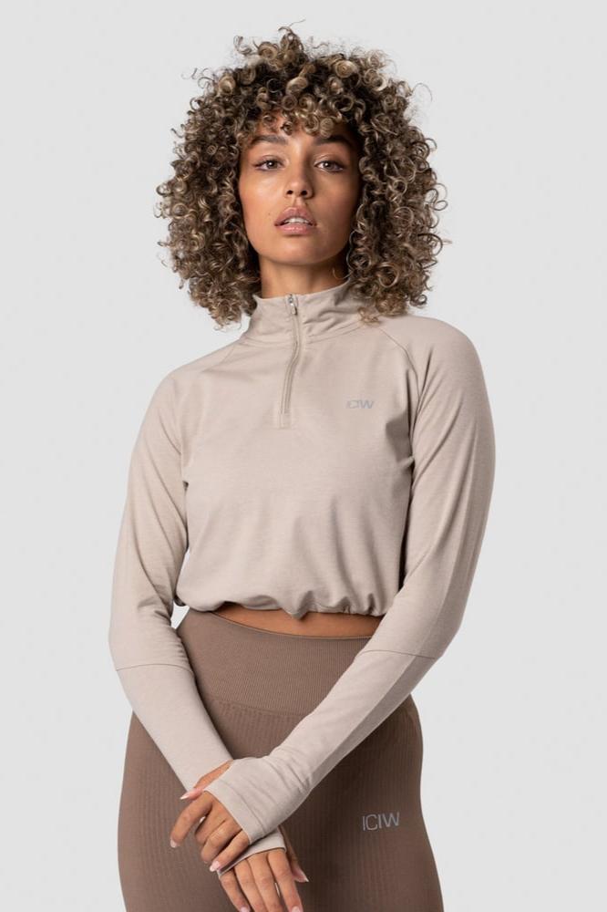 define cropped 1/4 zip adjustable sand